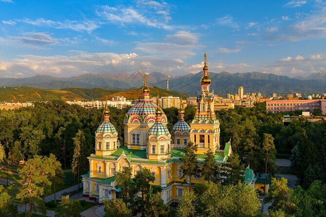 Experience Almaty, Medeu, shymbulak resort and Kok-tobe - Stop 3: Kok-Tobe Park for skyline photos, rides, and casual snacks